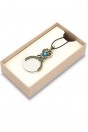 Loupe pendentif perle bleue en verre de Murano