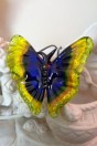 Pendentif papillon bleu et jaune
